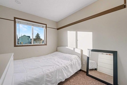 84 Hidden Green Nw, Calgary, AB - Indoor Photo Showing Bedroom