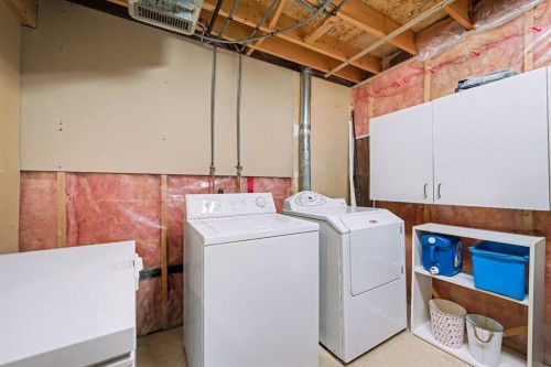 84 Hidden Green Nw, Calgary, AB - Indoor Photo Showing Laundry Room