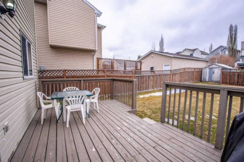 84 Hidden Green Nw, Calgary, AB - Outdoor With Deck Patio Veranda With Exterior
