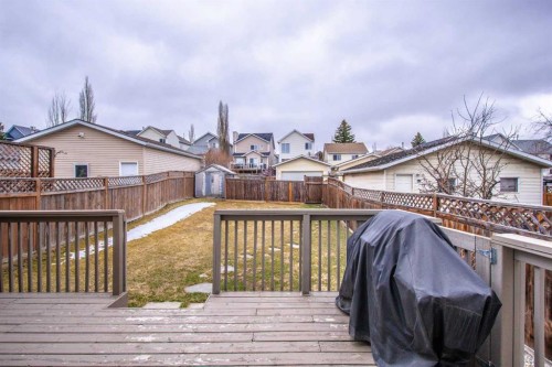 84 Hidden Green Nw, Calgary, AB - Outdoor With Deck Patio Veranda With Exterior