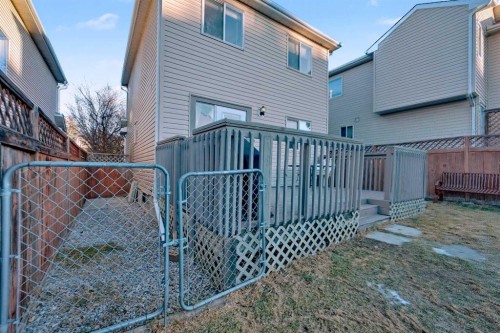 84 Hidden Green Nw, Calgary, AB - Outdoor With Deck Patio Veranda With Exterior