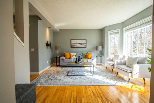 84 Hidden Green Nw, Calgary, AB - Indoor Photo Showing Living Room