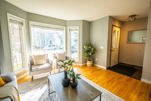 84 Hidden Green Nw, Calgary, AB - Indoor Photo Showing Living Room