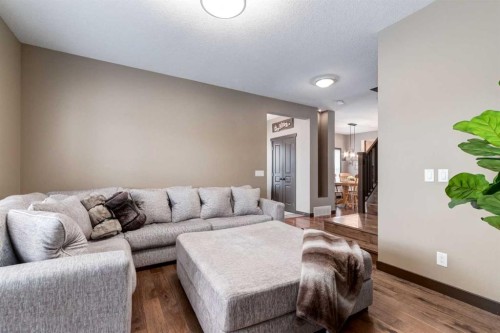 4 Copperpond Grove Se, Calgary, AB - Indoor Photo Showing Living Room