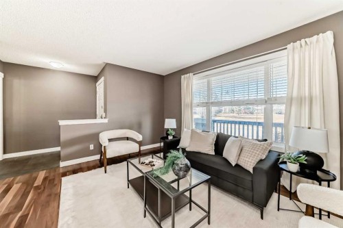 172 Morningside Manor Sw, Airdrie, AB - Indoor Photo Showing Living Room