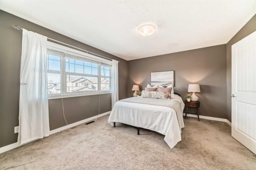 172 Morningside Manor Sw, Airdrie, AB - Indoor Photo Showing Bedroom