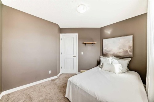 172 Morningside Manor Sw, Airdrie, AB - Indoor Photo Showing Bedroom