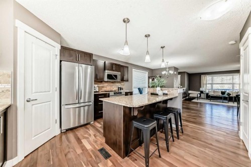 172 Morningside Manor Sw, Airdrie, AB - Indoor Photo Showing Kitchen With Stainless Steel Kitchen With Upgraded Kitchen