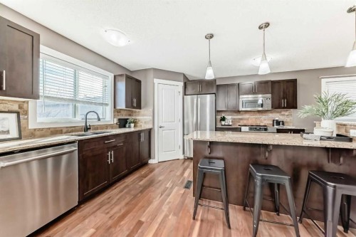 172 Morningside Manor Sw, Airdrie, AB - Indoor Photo Showing Kitchen With Stainless Steel Kitchen With Upgraded Kitchen