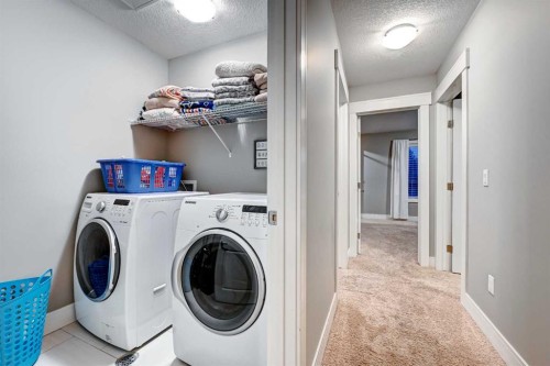 4418 19 Avenue Nw, Calgary, AB - Indoor Photo Showing Laundry Room