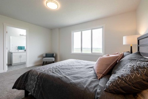 304 Edgefield Close, Strathmore, AB - Indoor Photo Showing Bedroom