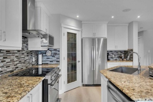 199 Hawkmere Road, Chestermere, AB - Indoor Photo Showing Kitchen With Upgraded Kitchen