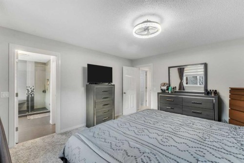 199 Hawkmere Road, Chestermere, AB - Indoor Photo Showing Bedroom