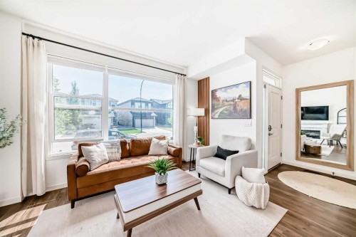 59 Wolf Hollow Way Se, Calgary, AB - Indoor Photo Showing Living Room