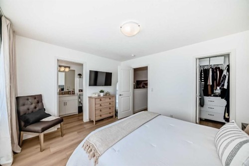 59 Wolf Hollow Way Se, Calgary, AB - Indoor Photo Showing Bedroom