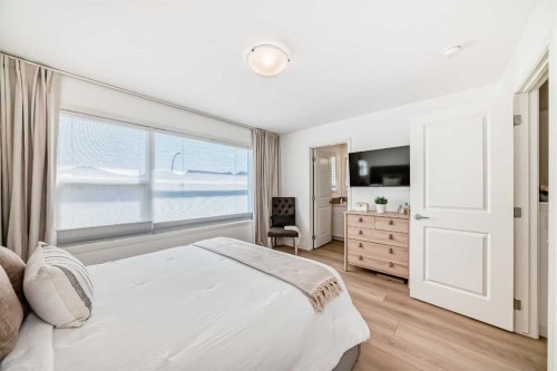 59 Wolf Hollow Way Se, Calgary, AB - Indoor Photo Showing Bedroom