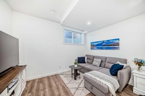 59 Wolf Hollow Way Se, Calgary, AB - Indoor Photo Showing Living Room