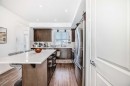 59 Wolf Hollow Way Se, Calgary, AB  - Indoor Photo Showing Kitchen With Upgraded Kitchen 