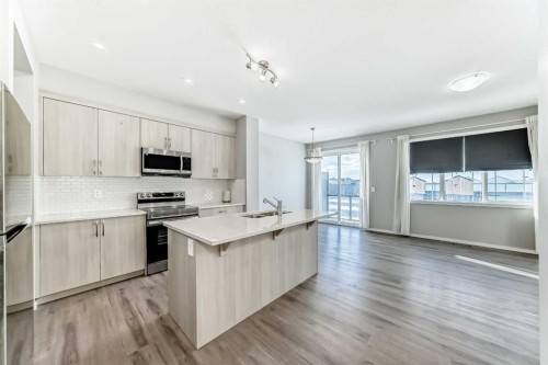 224 Carringham Way Nw, Calgary, AB - Indoor Photo Showing Kitchen With Stainless Steel Kitchen With Upgraded Kitchen