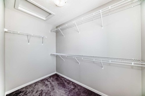 224 Carringham Way Nw, Calgary, AB - Indoor With Storage