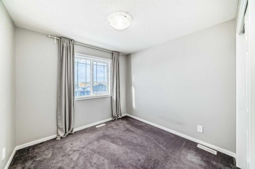 224 Carringham Way Nw, Calgary, AB - Indoor Photo Showing Other Room