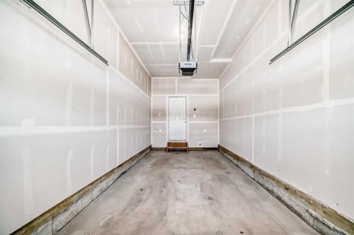 224 Carringham Way Nw, Calgary, AB - Indoor Photo Showing Garage