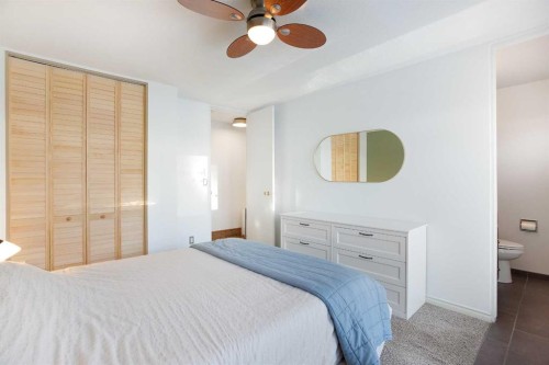 1012 Hunterston Hill Nw, Calgary, AB - Indoor Photo Showing Bedroom