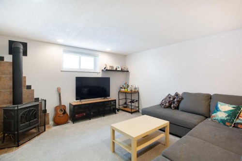 1012 Hunterston Hill Nw, Calgary, AB - Indoor Photo Showing Living Room