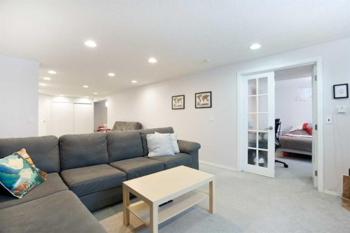 1012 Hunterston Hill Nw, Calgary, AB - Indoor Photo Showing Living Room