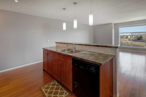 2429-700 Willowbrook Road Nw, Airdrie, AB - Indoor Photo Showing Kitchen With Double Sink