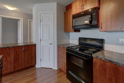 2429-700 Willowbrook Road Nw, Airdrie, AB - Indoor Photo Showing Kitchen