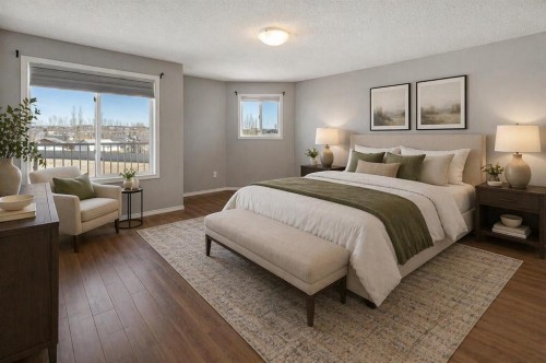 2429-700 Willowbrook Road Nw, Airdrie, AB - Indoor Photo Showing Bedroom