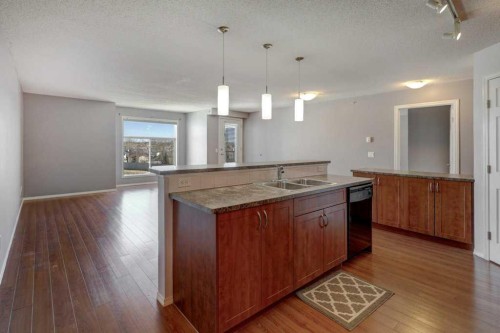 2429-700 Willowbrook Road Nw, Airdrie, AB - Indoor Photo Showing Kitchen With Double Sink