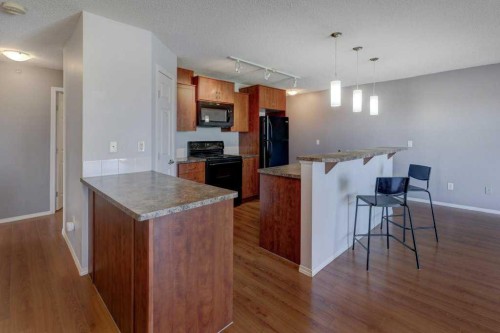 2429-700 Willowbrook Road Nw, Airdrie, AB - Indoor Photo Showing Kitchen