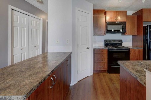 2429-700 Willowbrook Road Nw, Airdrie, AB - Indoor Photo Showing Kitchen