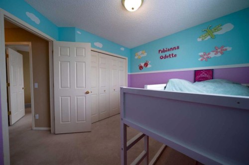11 Arbour Stone Crescent Nw, Calgary, AB - Indoor Photo Showing Bedroom