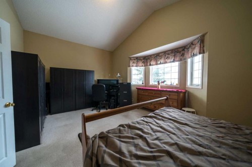 11 Arbour Stone Crescent Nw, Calgary, AB - Indoor Photo Showing Bedroom