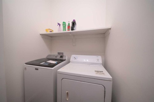 11 Arbour Stone Crescent Nw, Calgary, AB - Indoor Photo Showing Laundry Room
