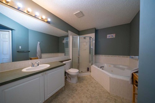 11 Arbour Stone Crescent Nw, Calgary, AB - Indoor Photo Showing Bathroom