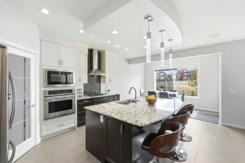 83 Nolanfield Court Nw, Calgary, AB - Indoor Photo Showing Kitchen With Double Sink With Upgraded Kitchen