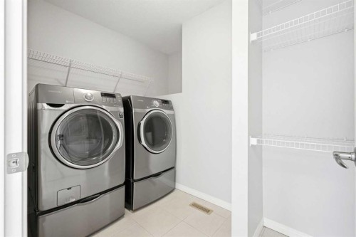 83 Nolanfield Court Nw, Calgary, AB - Indoor Photo Showing Laundry Room