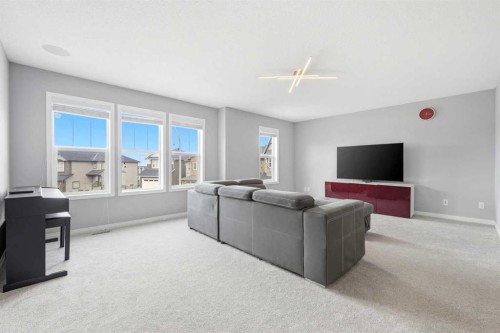 83 Nolanfield Court Nw, Calgary, AB - Indoor Photo Showing Living Room
