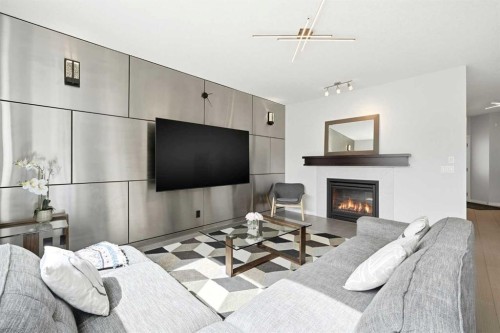 83 Nolanfield Court Nw, Calgary, AB - Indoor Photo Showing Living Room With Fireplace