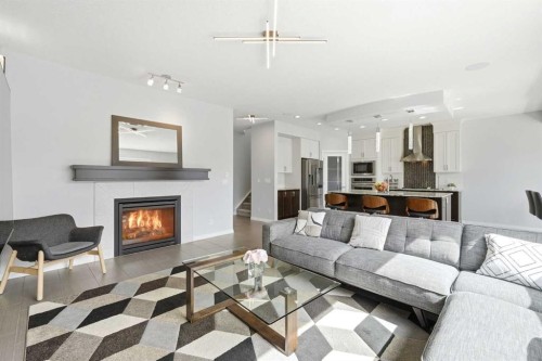 83 Nolanfield Court Nw, Calgary, AB - Indoor Photo Showing Living Room With Fireplace
