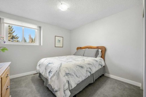 44 Deerbrook Crescent Se, Calgary, AB - Indoor Photo Showing Bedroom