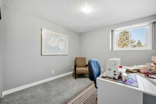 44 Deerbrook Crescent Se, Calgary, AB - Indoor Photo Showing Other Room