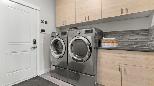 69 Sundown Grove, Cochrane, AB - Indoor Photo Showing Laundry Room