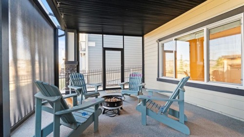69 Sundown Grove, Cochrane, AB - Outdoor With Deck Patio Veranda With Exterior