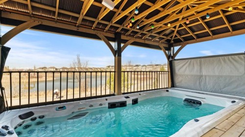 69 Sundown Grove, Cochrane, AB -  With Deck Patio Veranda With Exterior