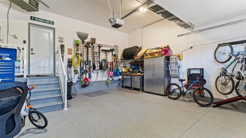 69 Sundown Grove, Cochrane, AB - Indoor Photo Showing Garage